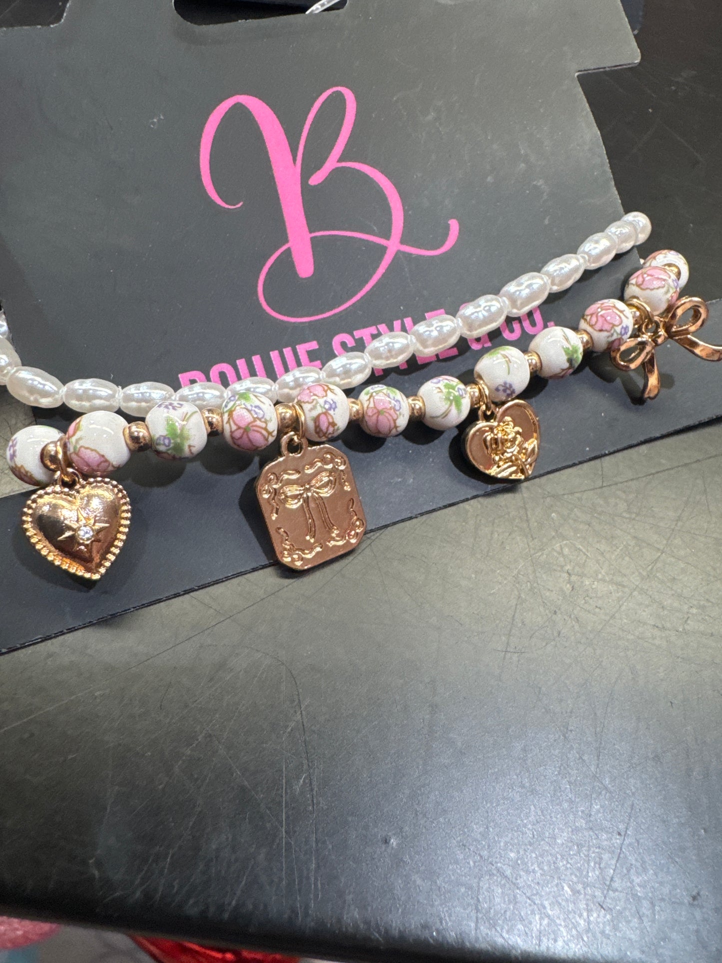 Multi charm pink porcelain bead bracelet