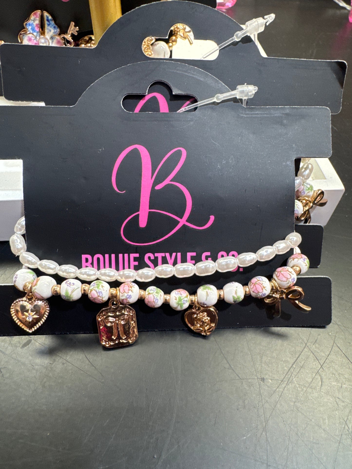 Multi charm pink porcelain bead bracelet